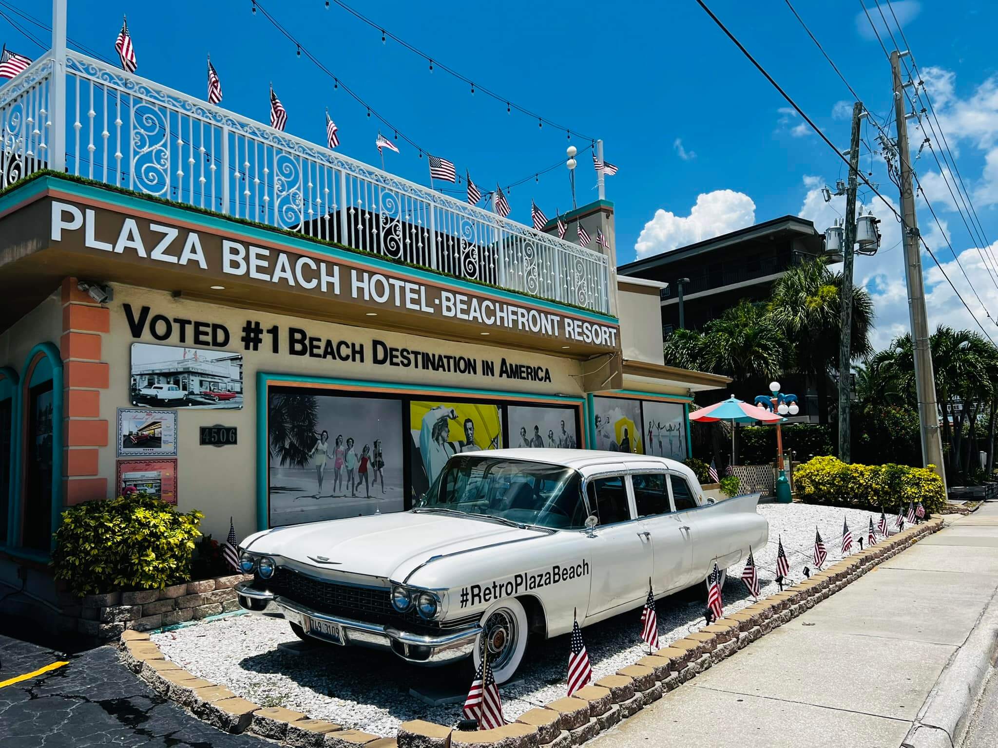 Plaza Beach Resort with car parked in the front