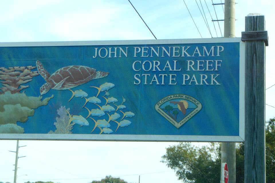 Sign that reads John Pennekamp Coral Reef State Park. 