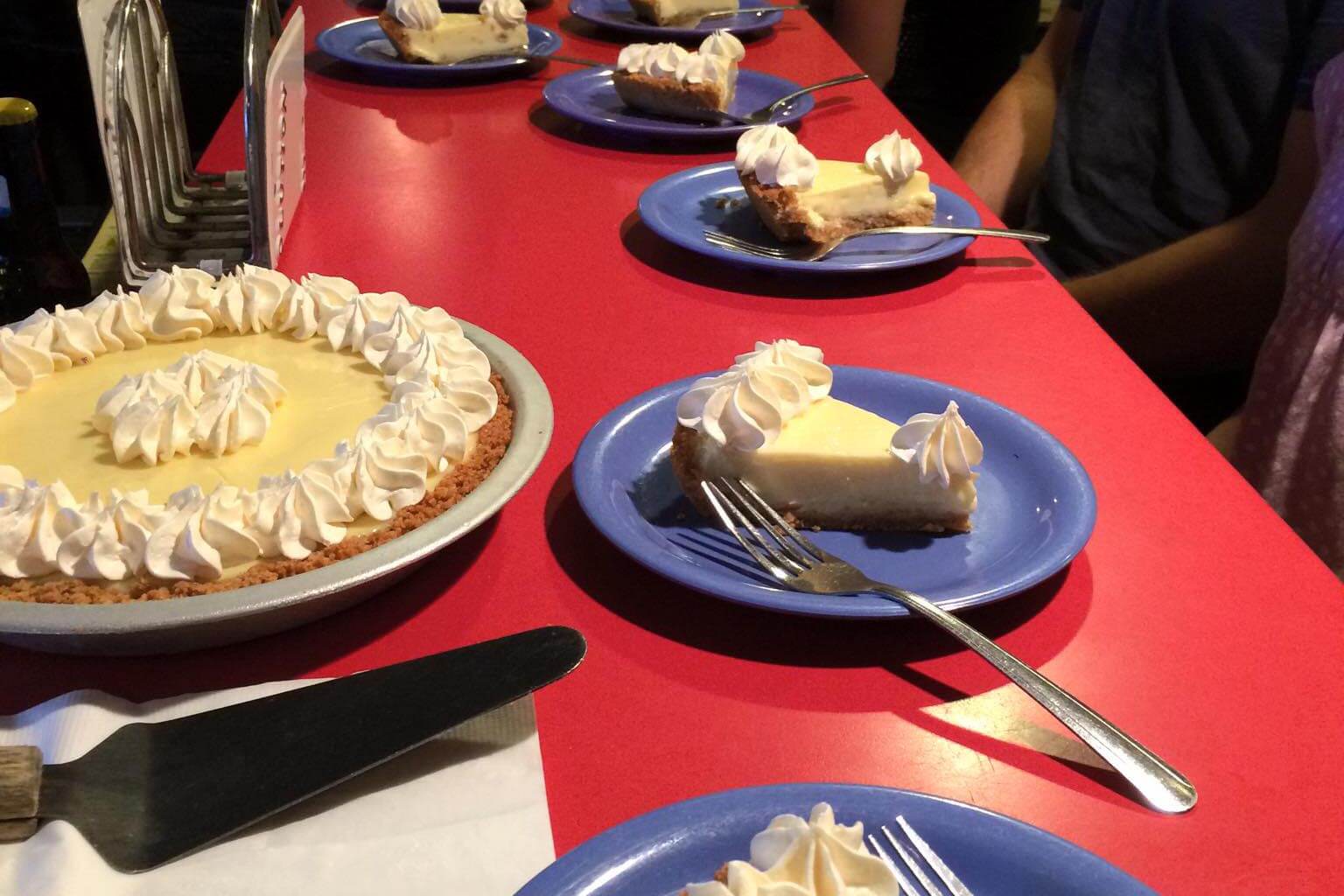 Key Lime pie and slices of key lime pie. 
