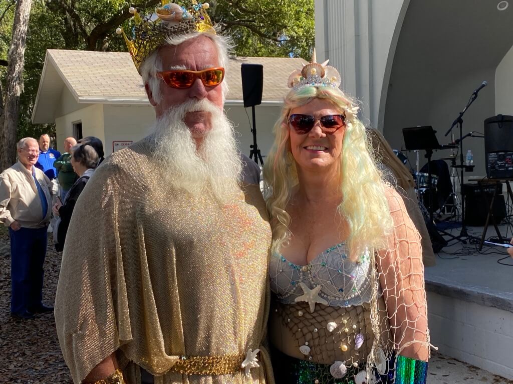 Couple dressed up at the Florida Mermaid Trail. 