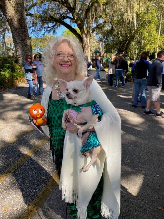 Woman with a dog at the Florida Mermaid Trail. 