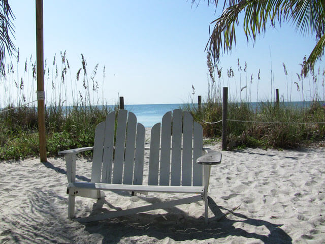 Photo of a bench on the beach