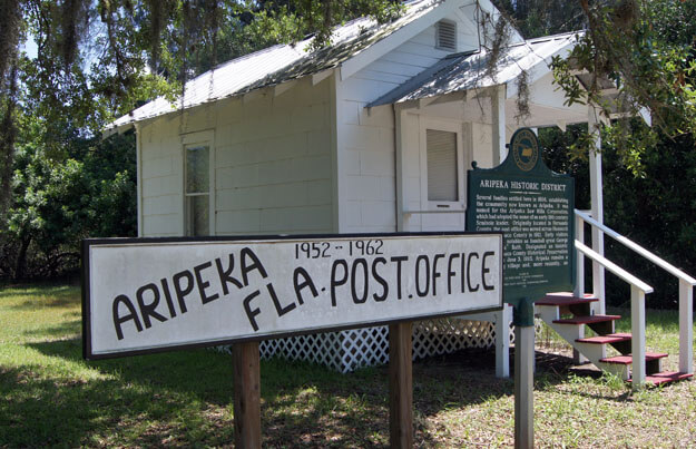 Photo of a sign for the Aripeka Post Office