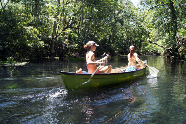 Photo of two girls kayaking