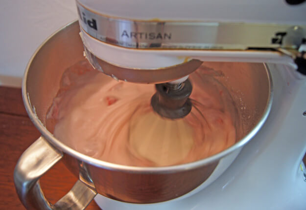Mixing in the strawberry mixture