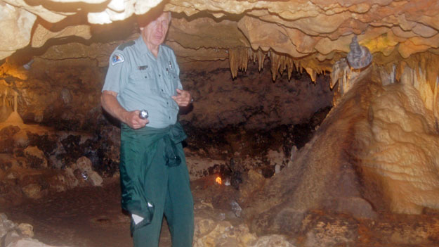 Photo of a park ranger in a cave in Florida Caverns State Park in Marianna