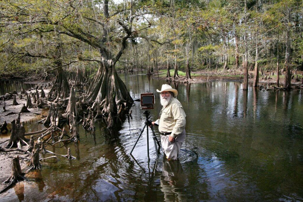 Photo of Clyde Butcher and a camera in Fisheating Creek