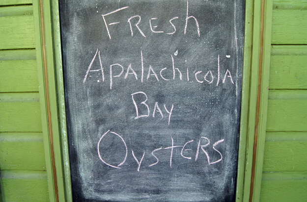 Sign that says Fresh Apalachicola Bay Oysters