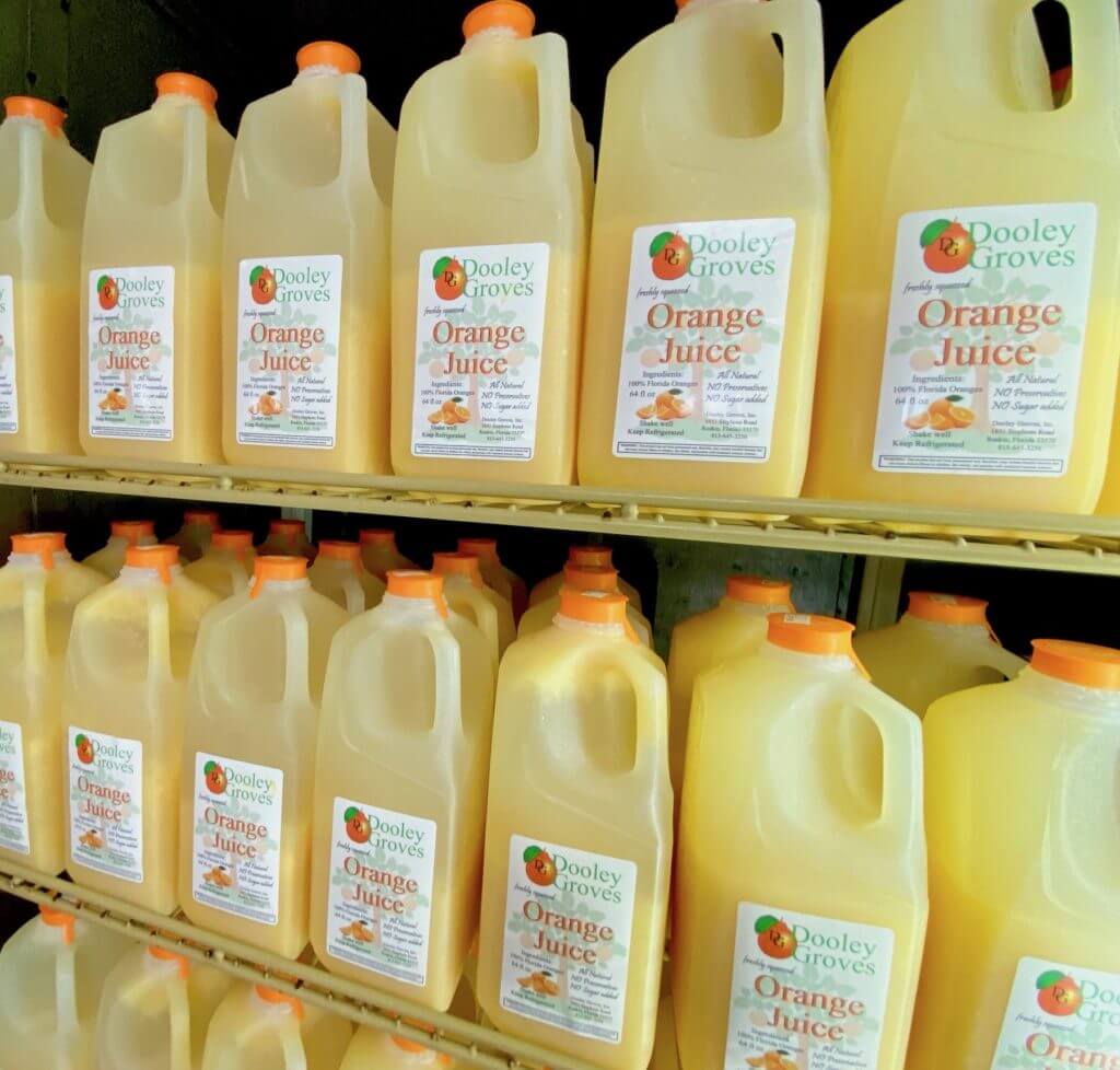 Photo of orange juice jugs