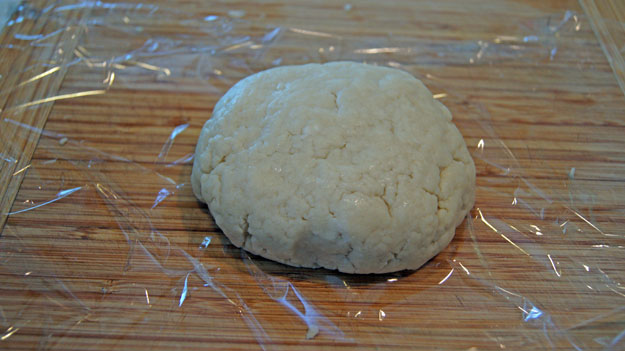 Ball of dough on saran wrap