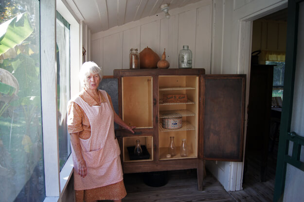 Photo of a woman near a pantry