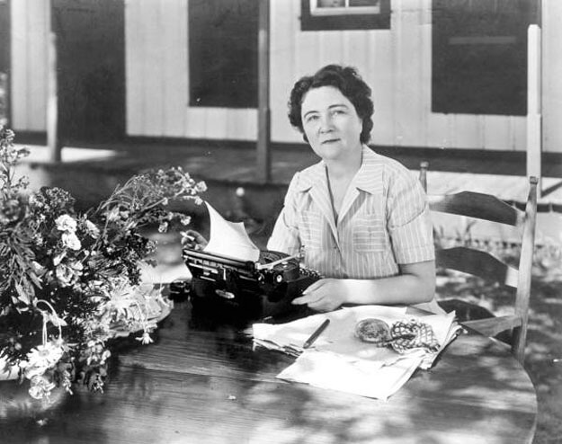 Photo of Marjorie Kinnan Rawlings with a typewriter