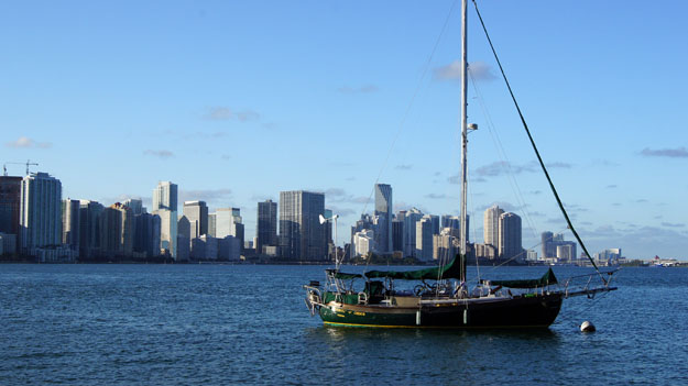 Photo of a boat with Miami in the background