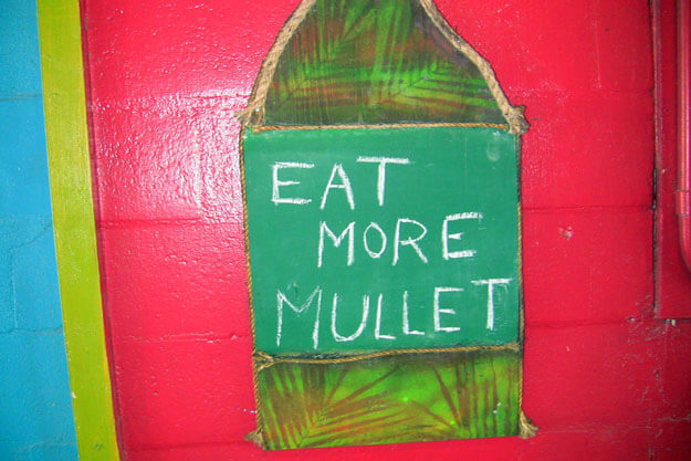 Photo of a sign that says eat more mullet