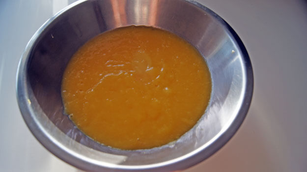 Pureed mango in a bowl. 
