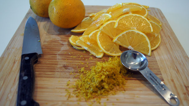 Diced oranges on a cutting board 