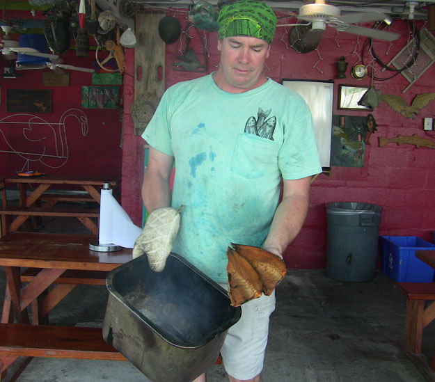 Man with smoked mullet - one of the Things to do in Pine Island. 