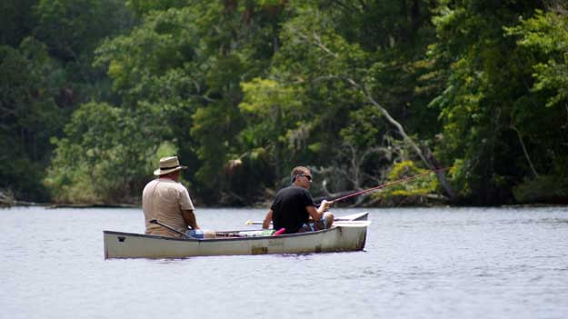 Photo of two fishermen in a boat