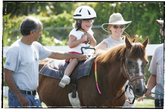 Photo of girl riding a horse at Freedom Ride
