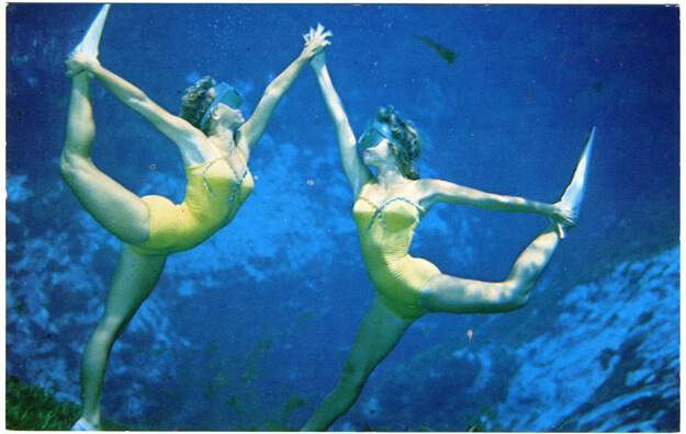 Photo of two women underwater at Weeki Wachee