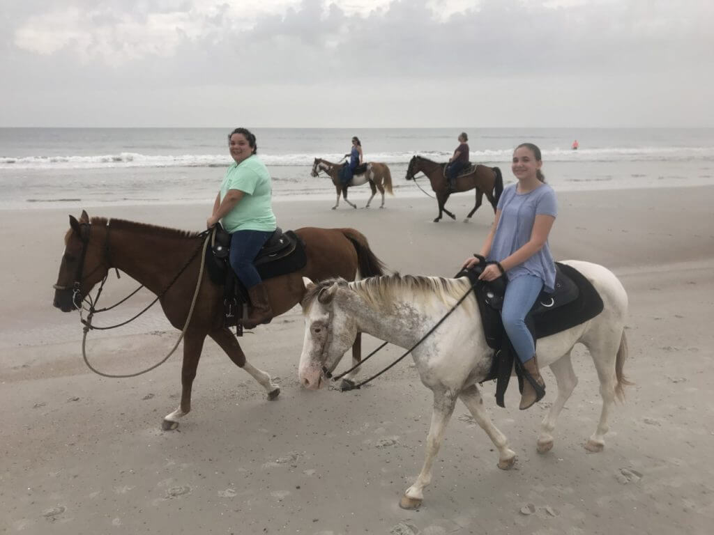 Photo of horseback riding on the beach at Amelia Island Horseback Riding