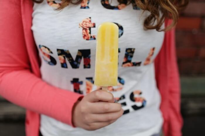 Photo of a woman holding a creamsicle
