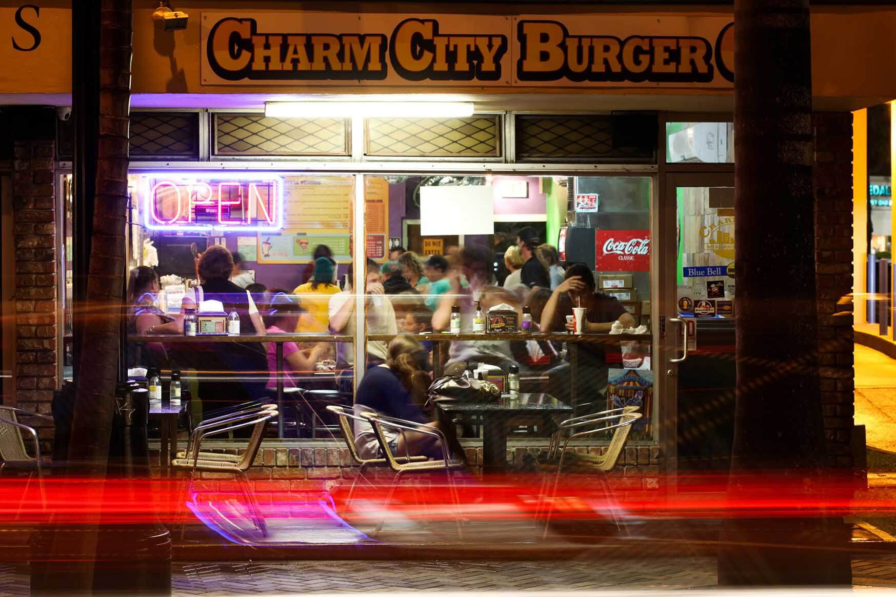 People eating at Charm City Burger. 