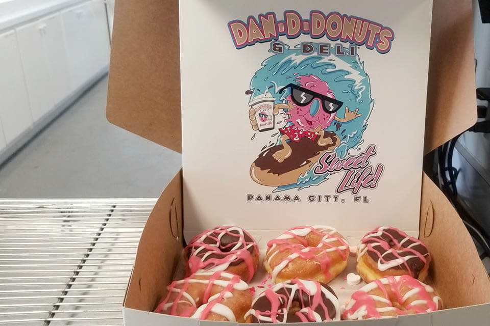 Dan D Donuts in a box. 
