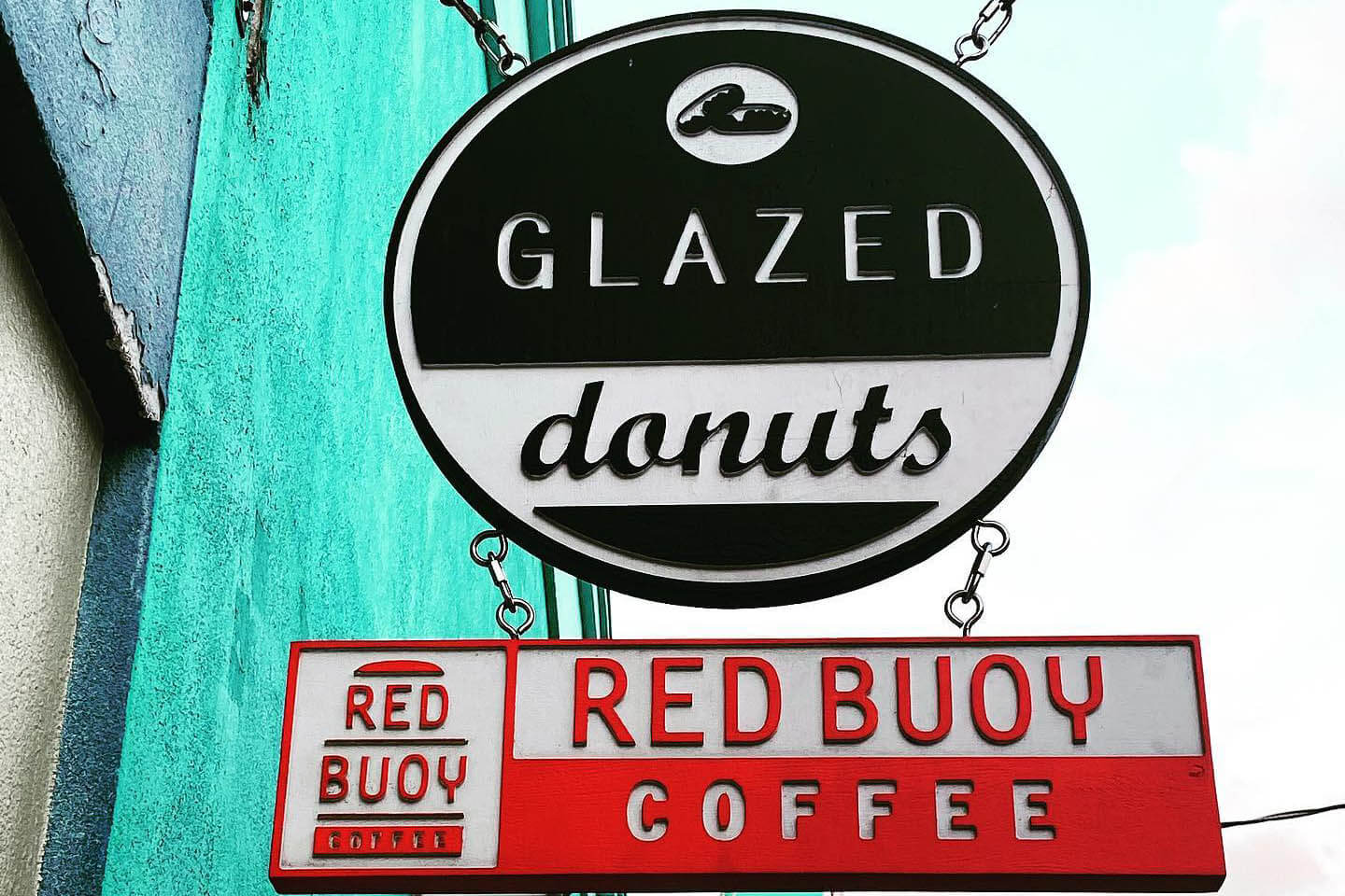 Sign that reads Glazed Donuts. 