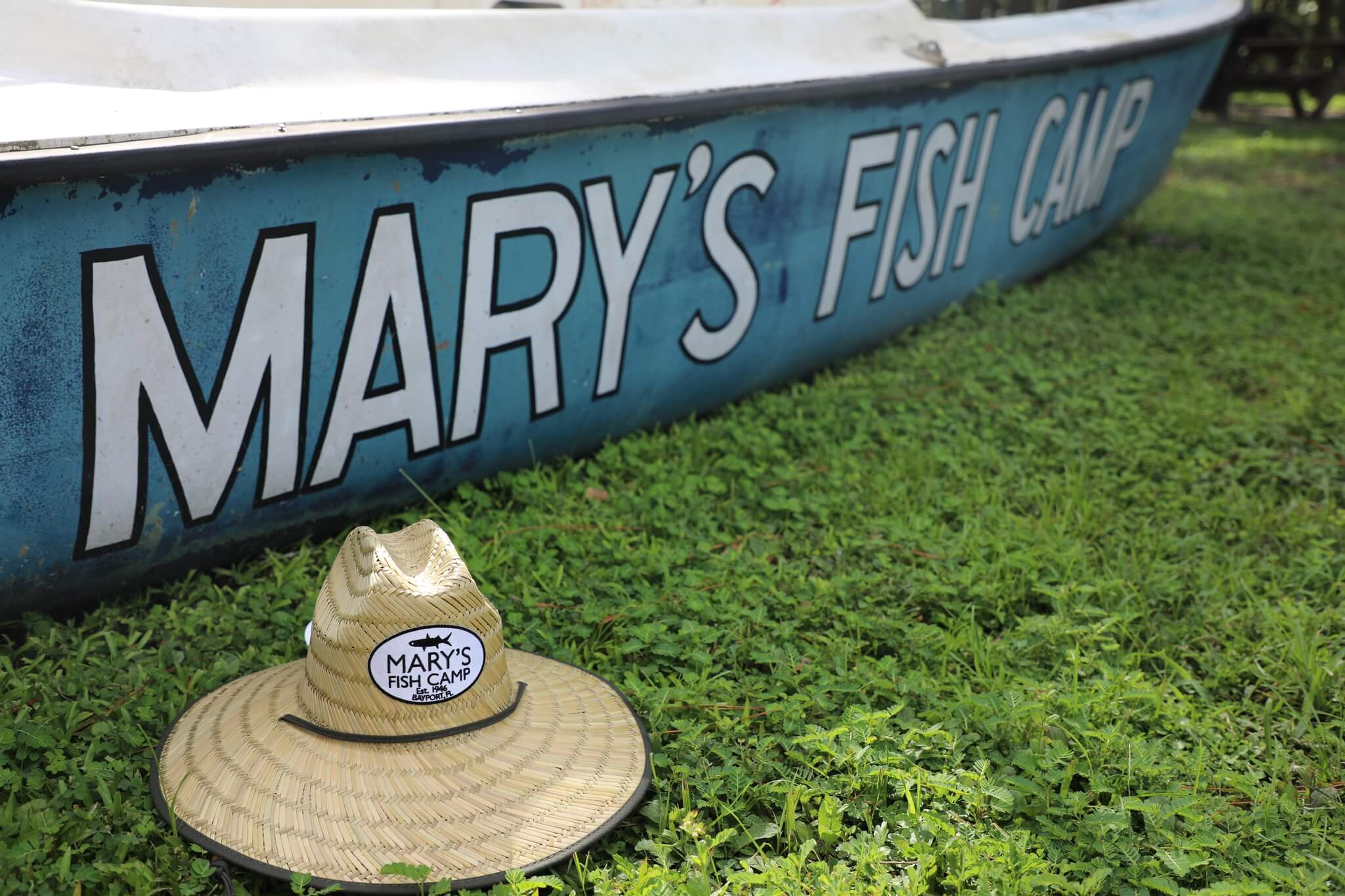 Boat with the words Mary's Fish Camp 