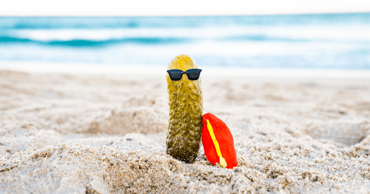Photo of a Pickle with sunglasses on the Beach