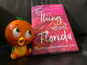 Photo of Orange Bird and the book "The Thing About Florida"