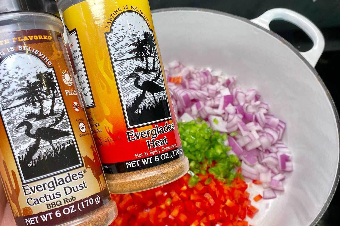 Everglades Seasonings in front of a pot of food.