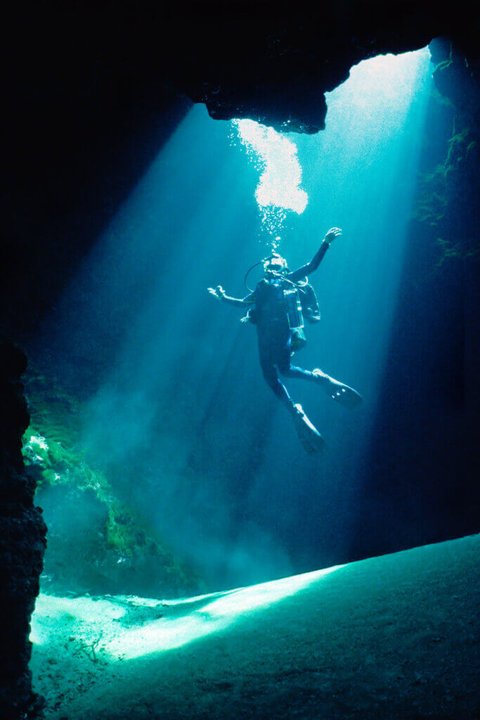 Diver in Blue Hole by John Moran