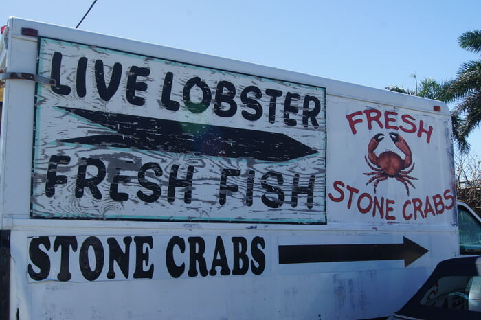 Photo of a sign for lobster and crabs