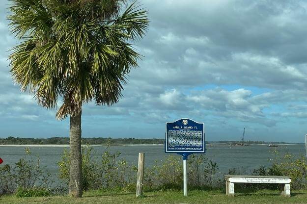 Amelia Island Historic Site Sign located across from the Pippi Longstocking House in Fernandina Beach