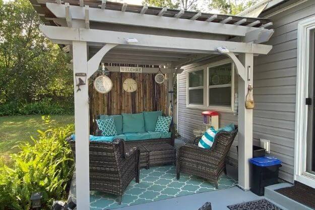 An outdoor seating area in a backyard. 