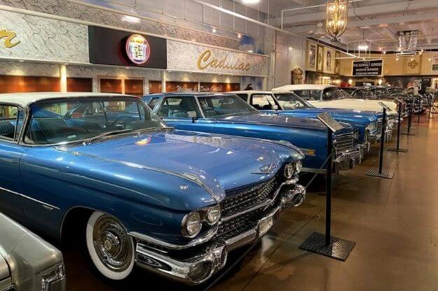 Row of classic cars in a museum. 