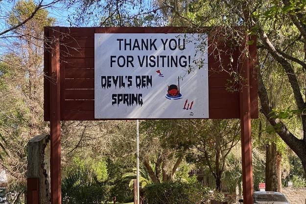 Sign that reads Thank you for visiting Devil's Den Spring. 