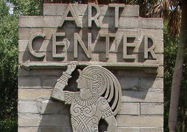 Sign with a man on it and the words Art Center. 