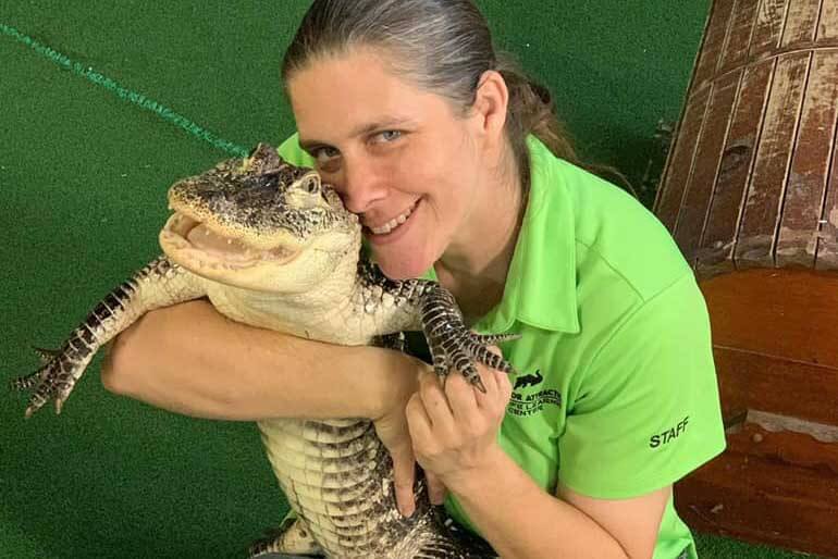 Staff with Alligator at Alligator and Wildlife Discovery Center