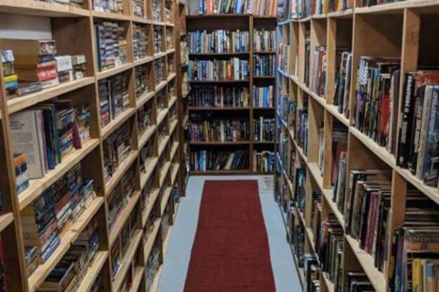 Aisle of bookshelves. 