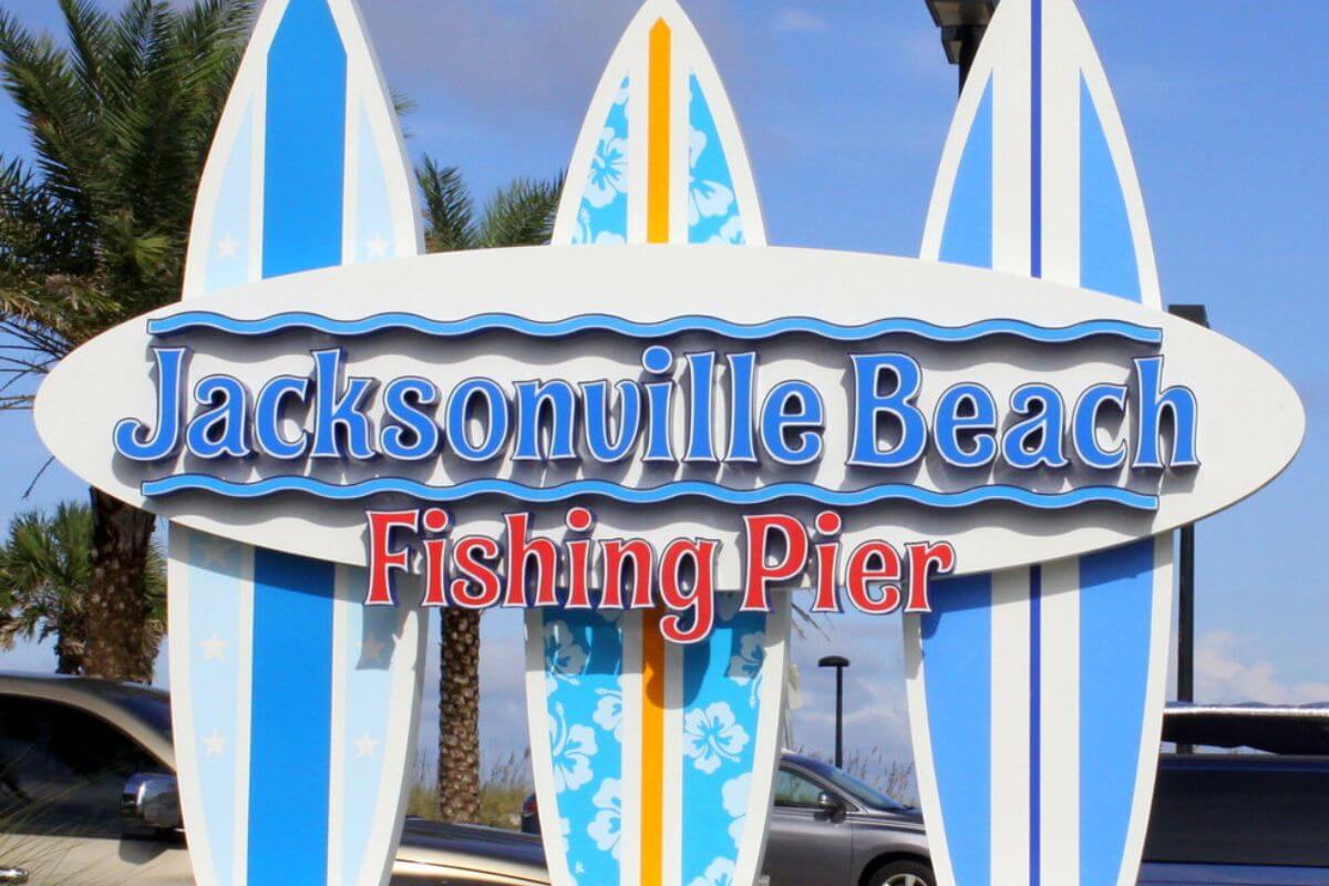 Sign that reads Jacksonville Beach Fishing Pier. 
