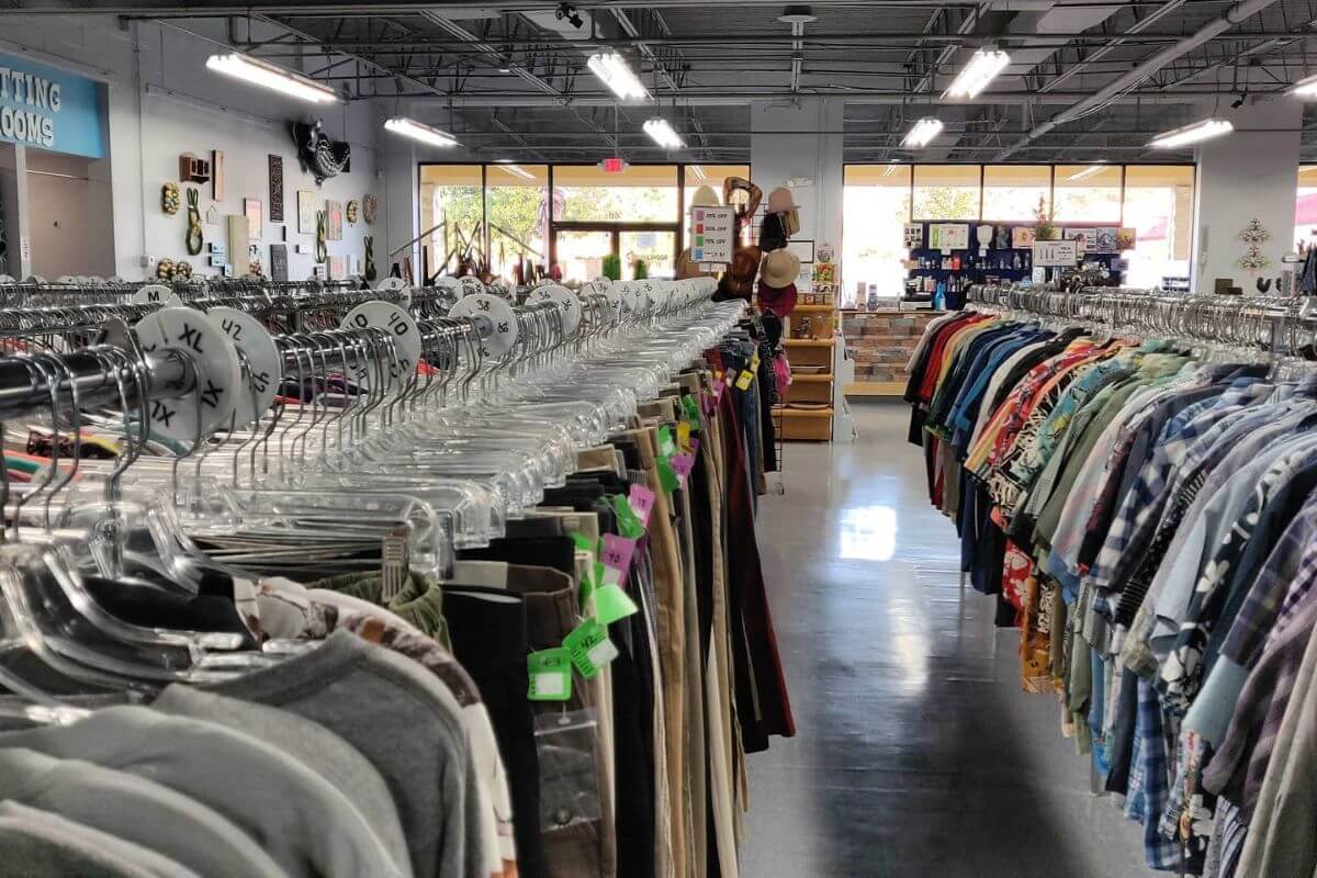 racks of clothes at store