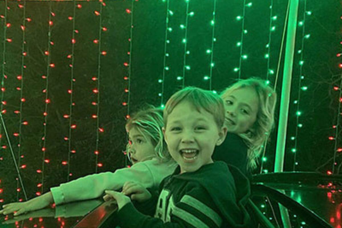 kids seeing holiday lights. 
