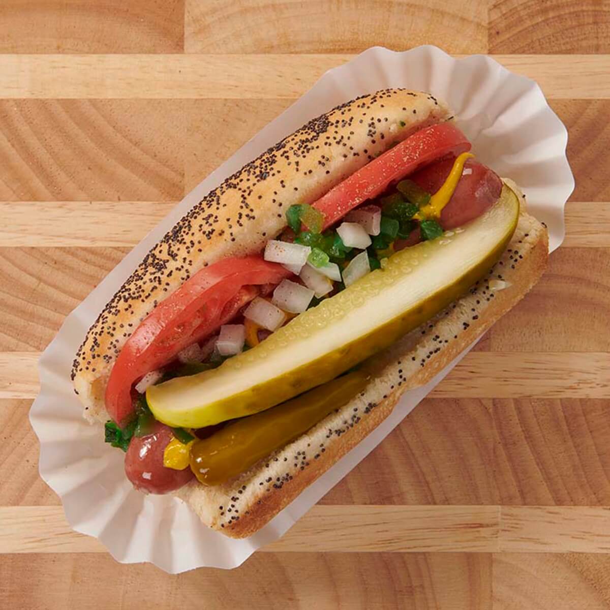 Hot dog with pickes and tomatoes at Portillos. 