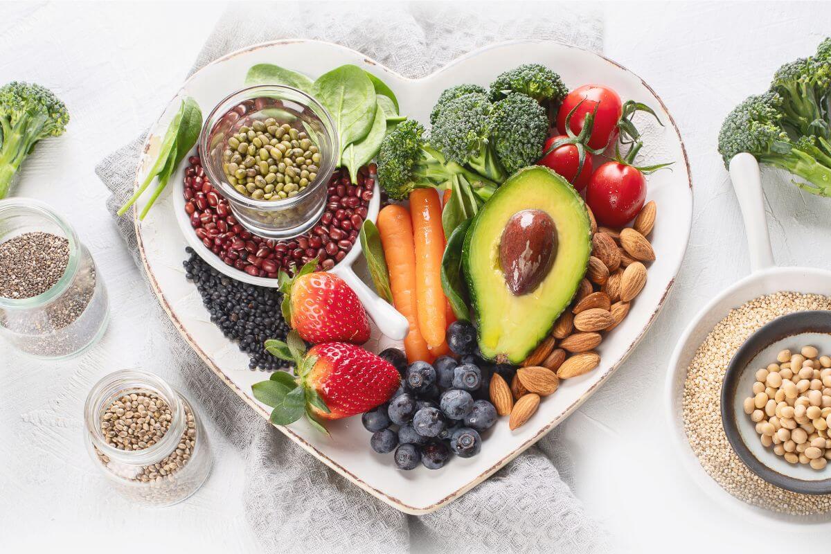 Vegan and Vegetarian heart shapes bowl of food choices.