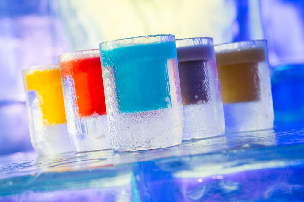 Ice bar shot glasses made of ice.
