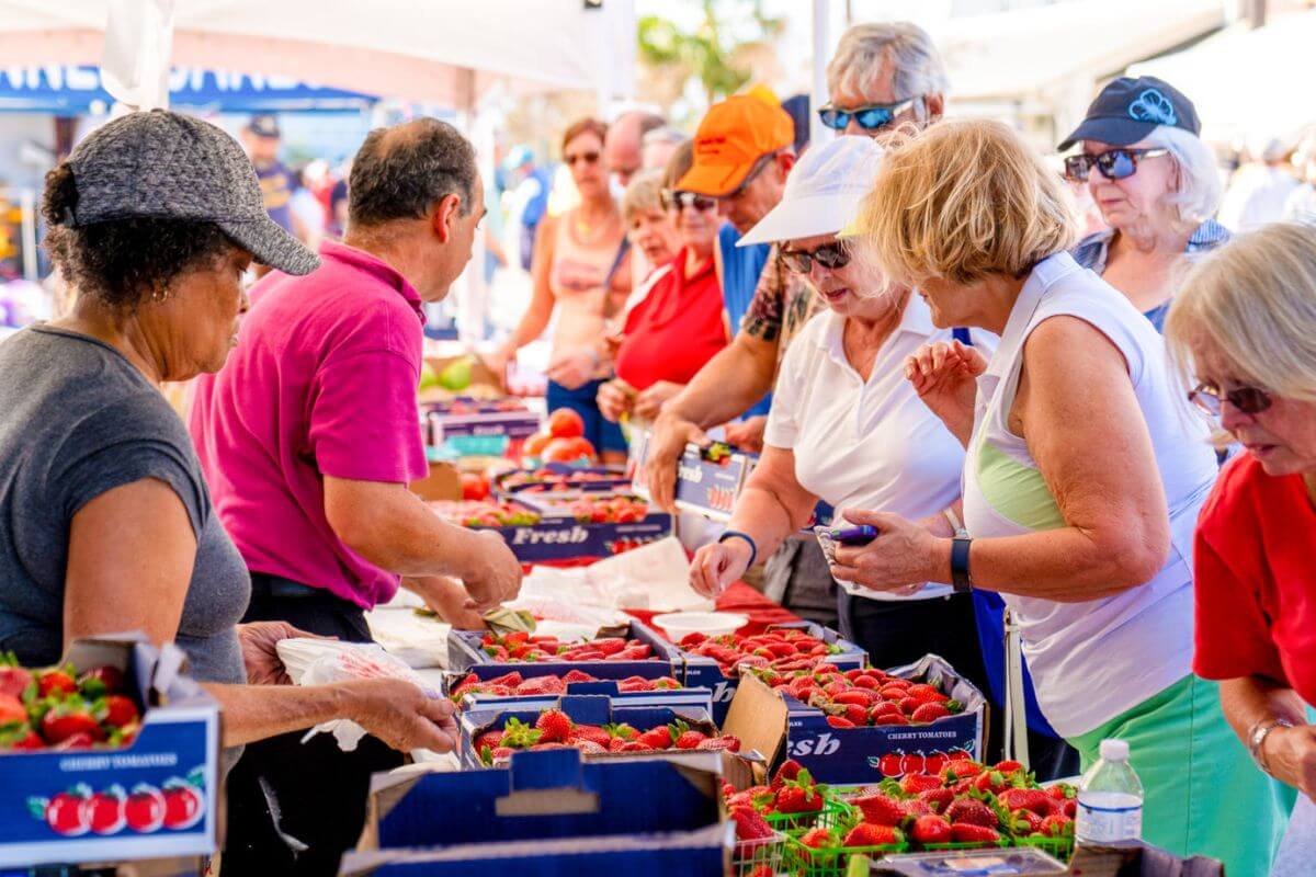 people looking at strawberries at Strawberry Festival in Florida