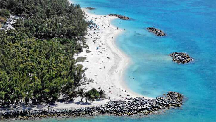Aerial view of a park and beachfront area in the keys. 